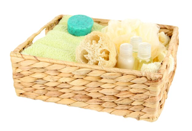 Set for spa in wicker basket isolated on white