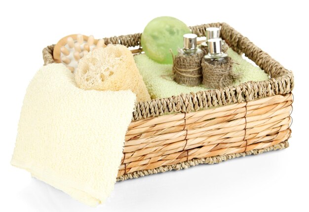 Photo set for spa in wicker basket isolated on white