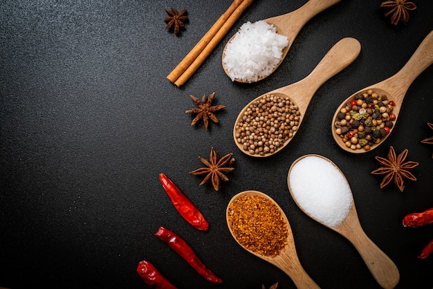 A set of spices and herbs with spoon