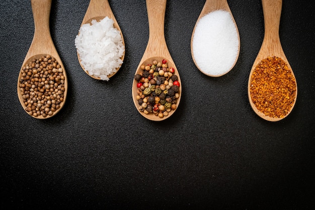 A set of spices and herbs with spoon