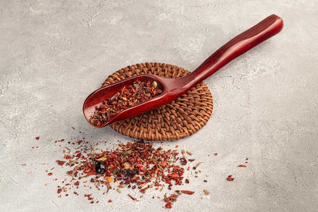 A set of spices on a light background in a glass bowl Enhancement of taste copy space