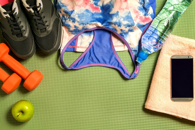 A set of sports equipment on the mat