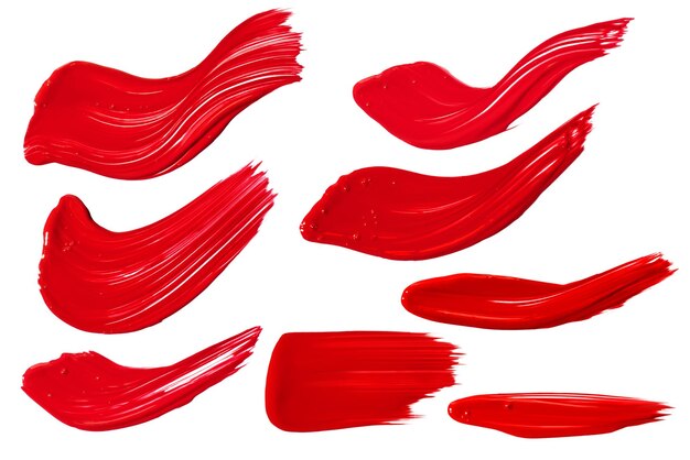 A set of strokes of red paint on a white background