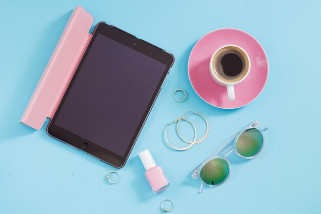 Set of  stylish woman accessories on blue background. Top view, flat lay