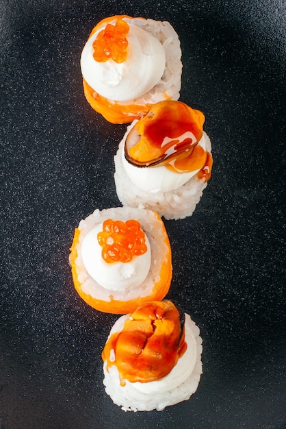 Set of sushi on a black background