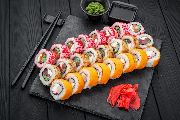 Set of sushi rolls with fresh fish