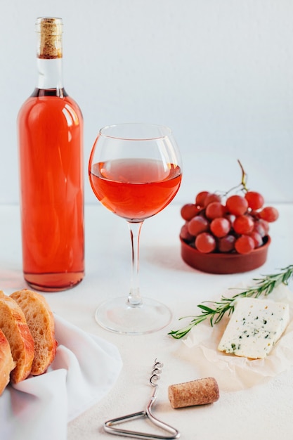 Set table with wine and food