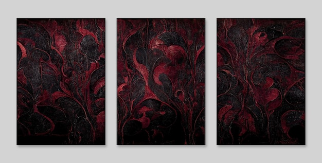 A set of three paintings with red swirls on them.