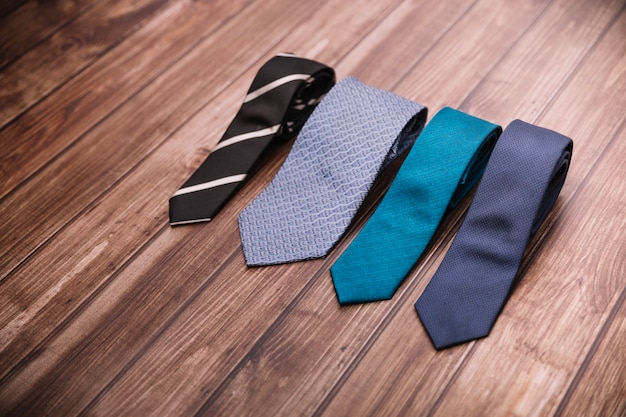 Set of ties on table