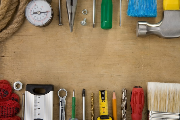 Set of tools and instruments on wood texture background