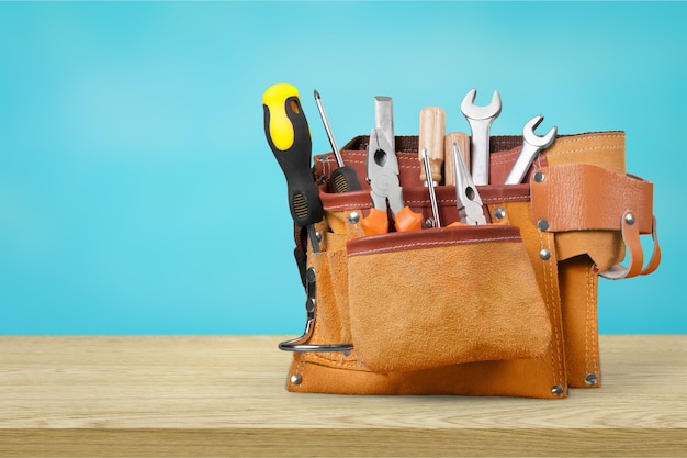 set of tools in tool box isolated at white background