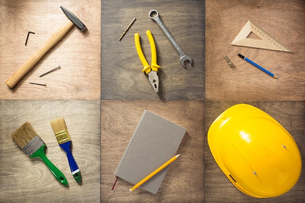 Photo set of tools at wooden background