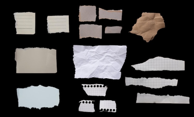 Set of torn and crumpled paper pieces isolated on black background.