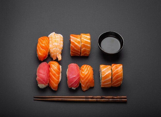 Set of traditional japanese sushi and rolls top view with