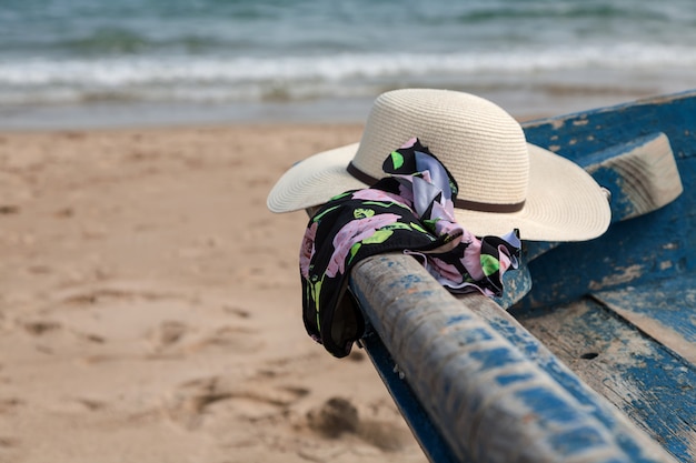 Set of various clothes and accessories for women on the beach