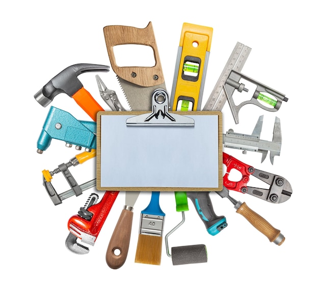 Set Of Various Construction Hand Working Tools Behind Clipboard With Copy Space Ssolated DIY Hardware Store Equipment