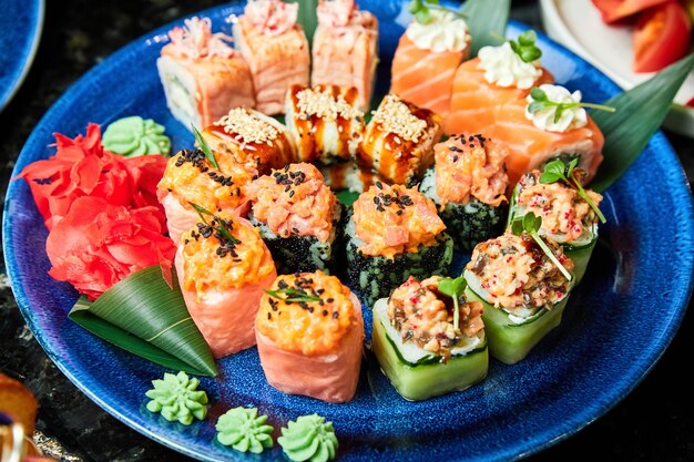 A set of various rolls on a blue plate