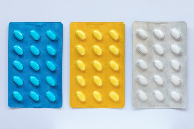 Set of various tablets in colorful blister pack