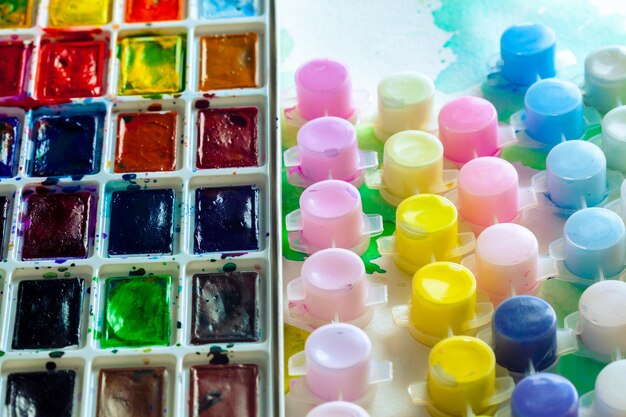 Set of watercolor paints and paintbrushes for painting