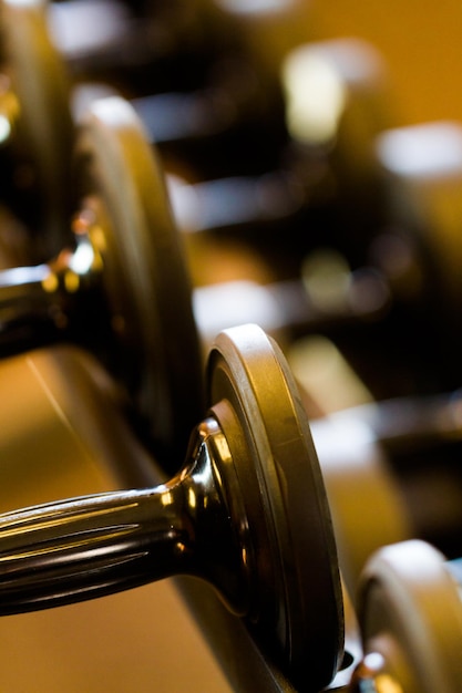 Set of weights in a small gym.