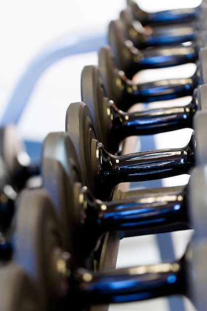 Set of weights in a small gym.