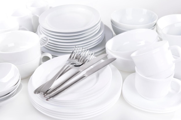 Set of white dishes closeup