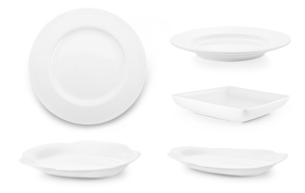 Set of white plates on white background