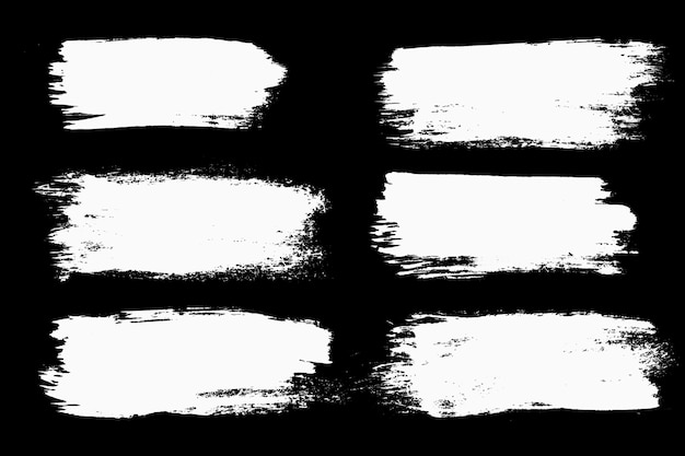 A set of white strokes isolated on a black background. High quality photo