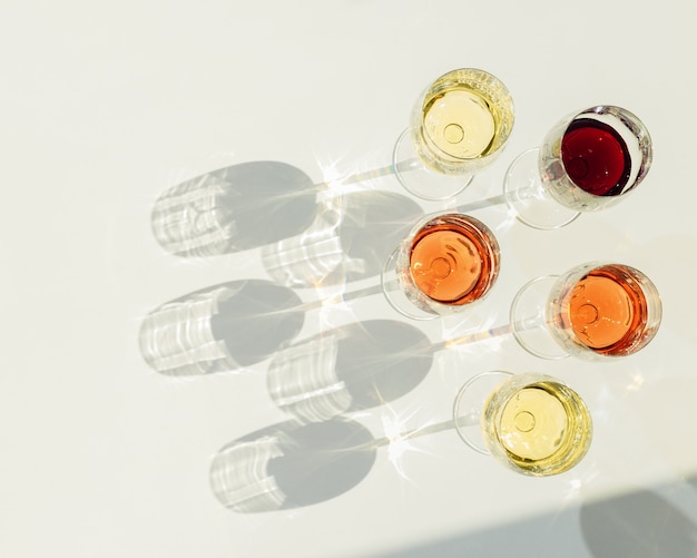 Set of wine in glasses with beautiful shadows