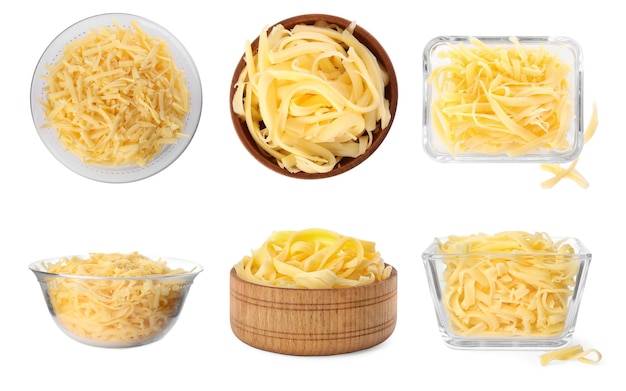 Set with bowls of grated cheese on white background