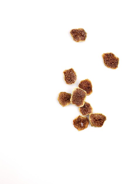 Set with delicious dried fig fruits on white background