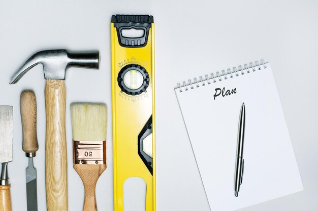 Set of working tools and notebook with plan word diy concept