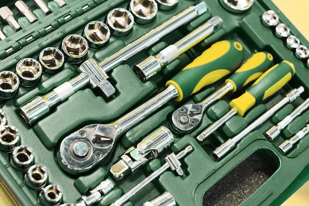 A set of wrenches in a plastic box A set for car repair Closeup photo