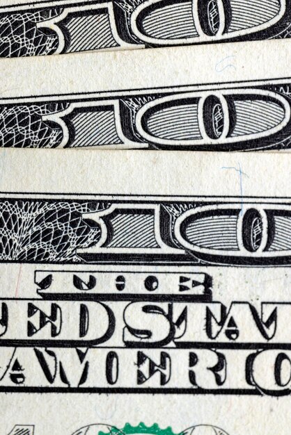 Photo several american hundred dollar bills closeup details of paper american cash dollars