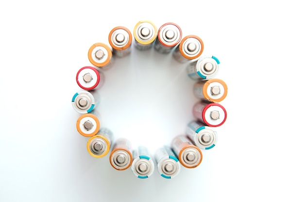 Several batteries in round form  . Isolated.