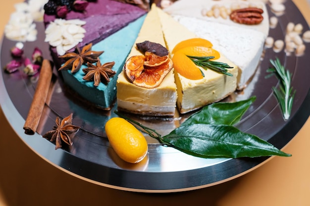Several cakes are symmetrically laid out on a metal plate Food delivery Homemade baking