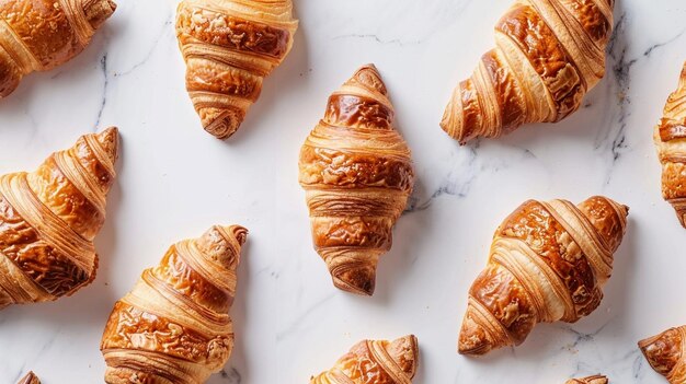 Photo several delicious croissants on a white table