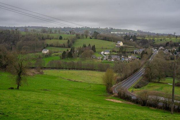 Several houses and green meadows highway Countryside in France