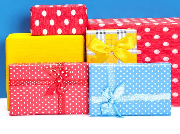 Several multicolored gift boxes Presents set closeup