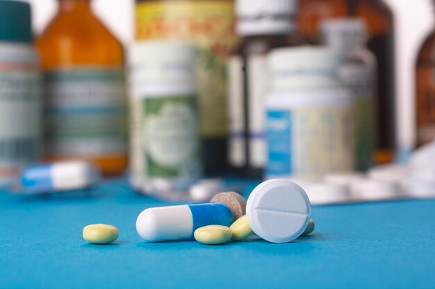 Several pills close up on the table.