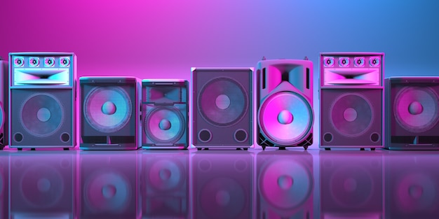 Several powerful loudspeakers close-up in neon lighting