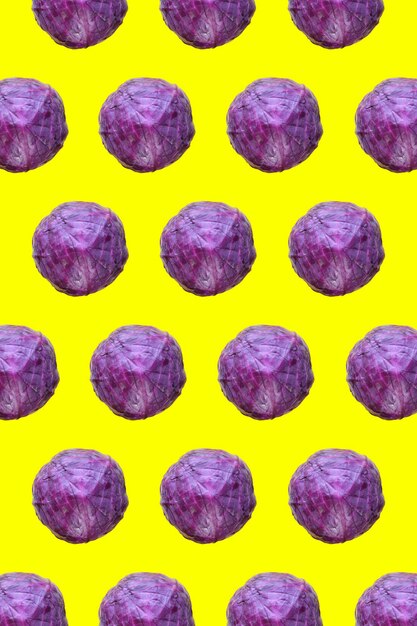 Several red cabbage against yellow background