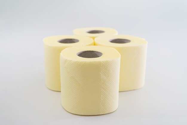 Several rolls of toilet paper on a white background.