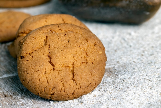 Several round light cookies after cooking