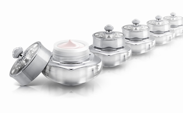 Several silver deluxe cosmetic jars