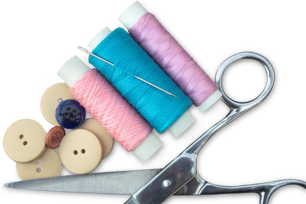 Photo sewing accessories on a white background the concept of sewing needlework