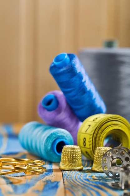 Photo sewing items on the old wooden table