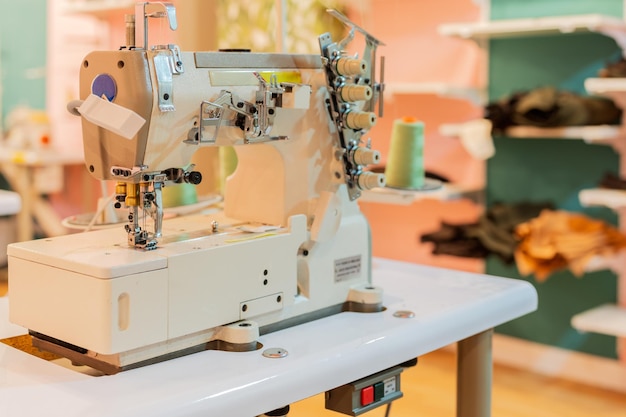 Sewing machine on top of a table in a sewing workshop