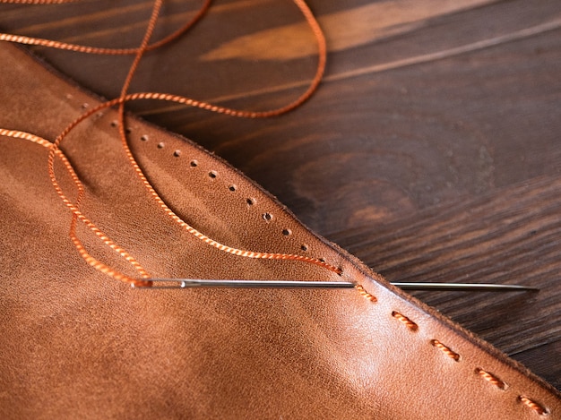 Sewing a purse, wallet, bag, backpack. Tool for working with genuine leather.