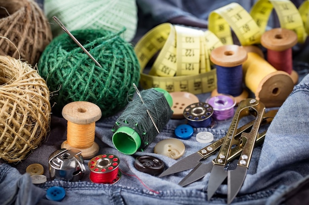 Premium Photo | Sewing threads and needles